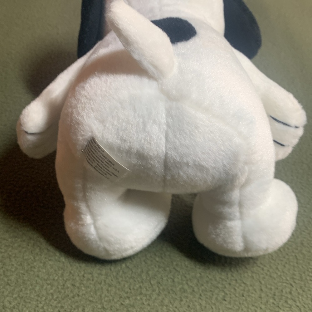 Stuffed Snoopy in sitting position by Peanuts Worldwide LLC. Approx 7” x 10”. - Picture 7 of 7